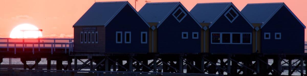 Busselton Jetty showing general coastal views and a sunset