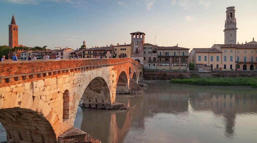Adige River showing a river or creek, a sunset and a bridge