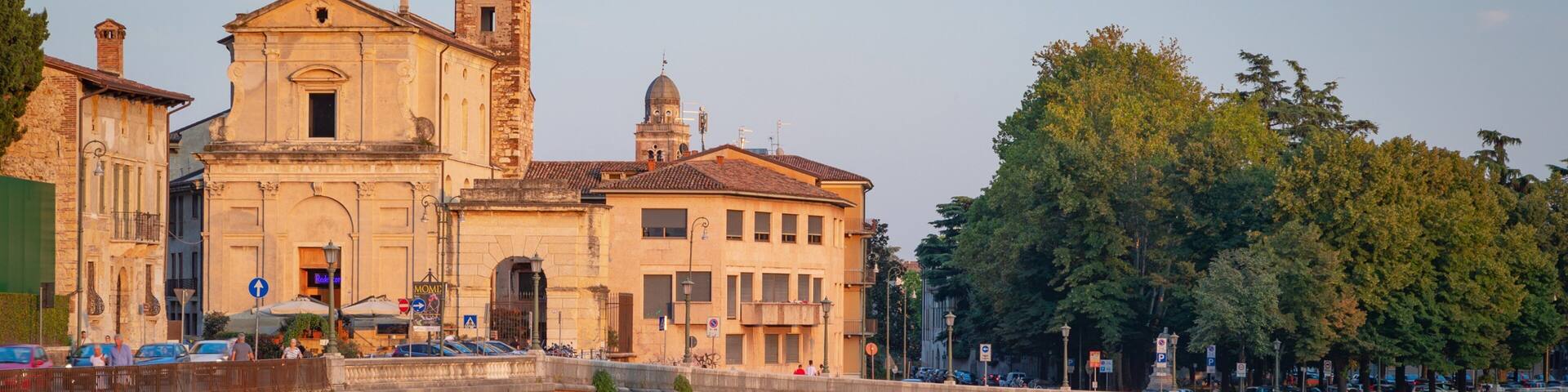 Adige River featuring a sunset, a river or creek and heritage architecture