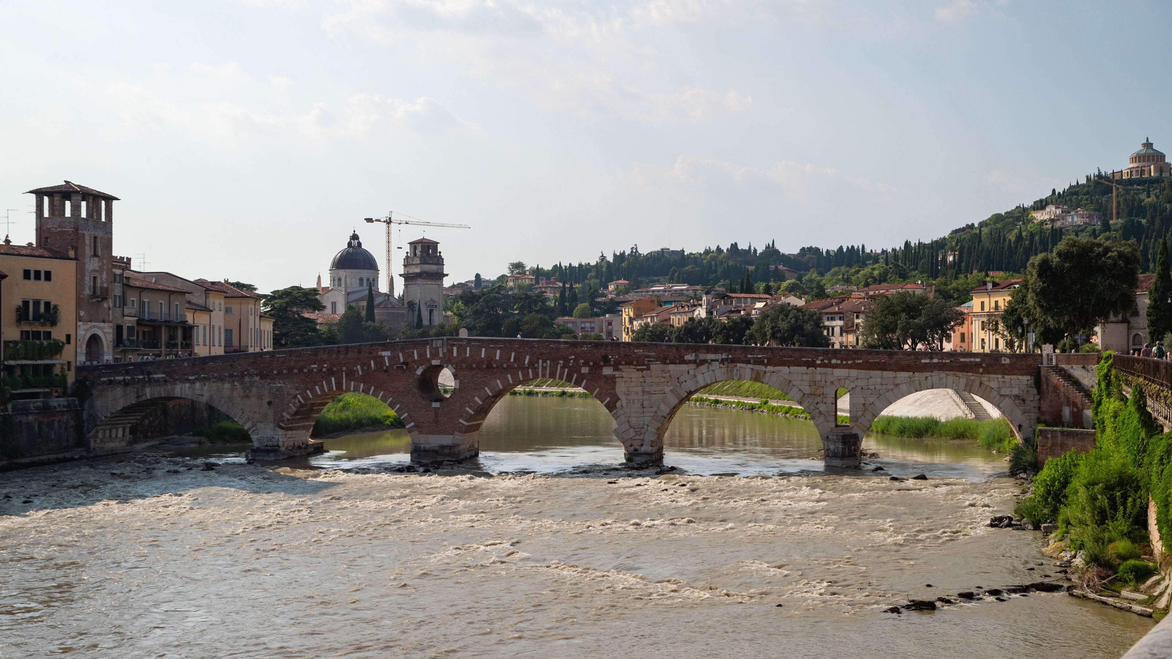 Adige River which includes a river or creek and a bridge