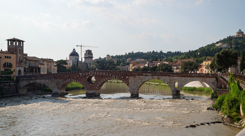 Adige River which includes a river or creek and a bridge
