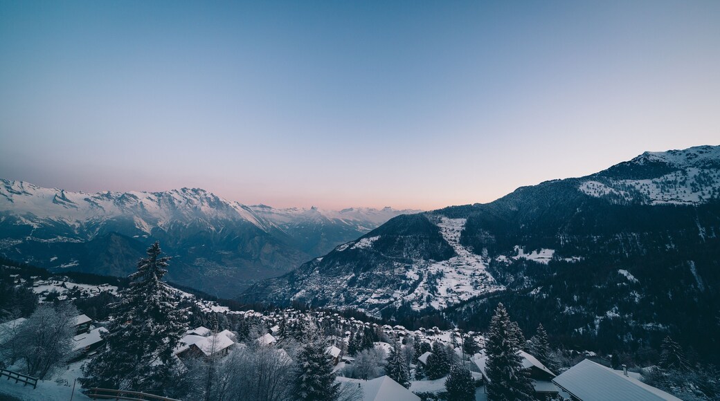 The swiss alps village of La Tzoumaz at dawn in winter, Valais, Switzerland.