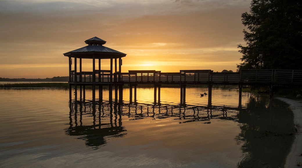 Sunrise over a gazebo at a small lake in a central Florida retirement community
