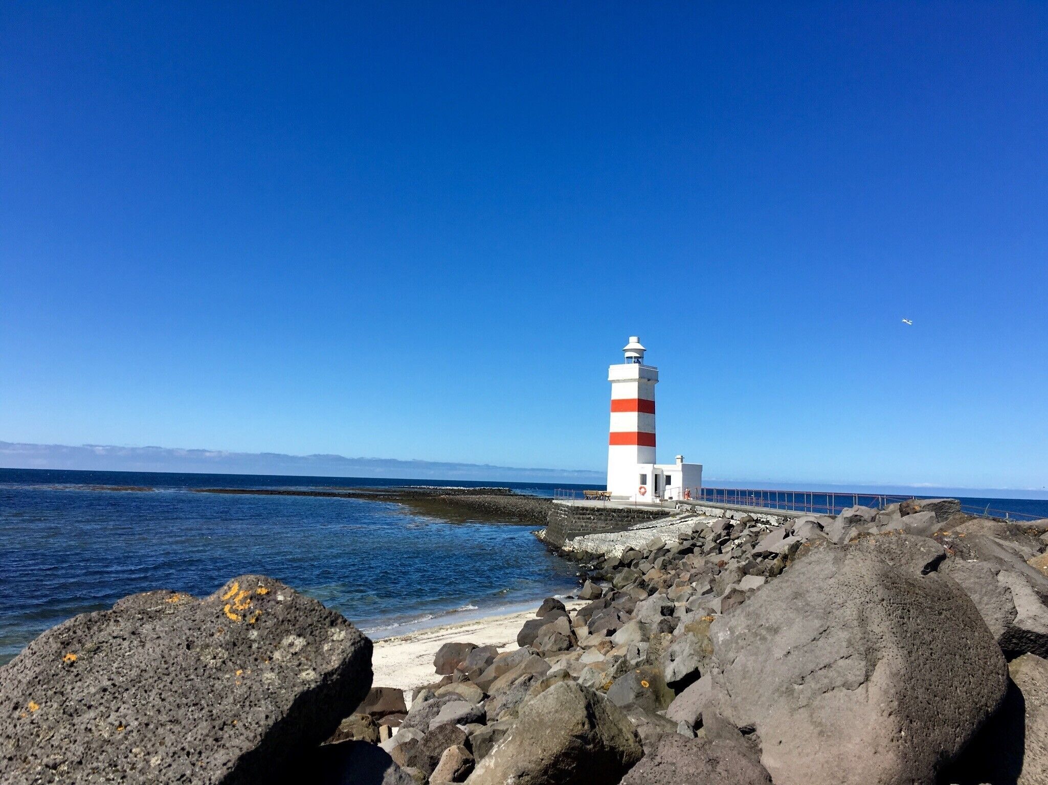 In southwestern Iceland, you'll find this lovely lighthouse on a cold Icelandic beach. There is a great restaurant nearby, it's also apparently a good spot for viewing the northern lights. #LifeAtExpedia