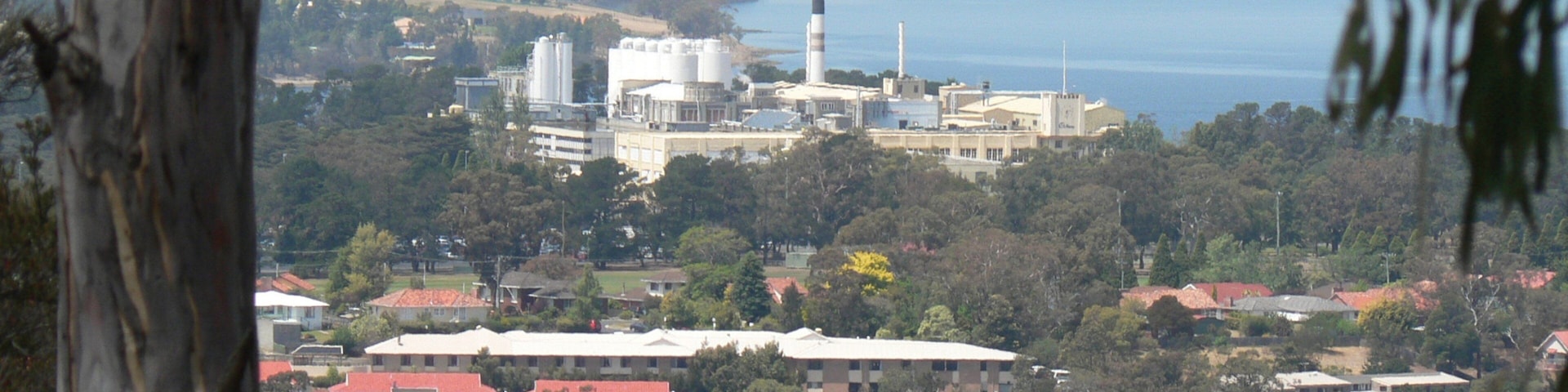 Cadbury Chocolate Factory showing industrial elements, general coastal views and a river or creek