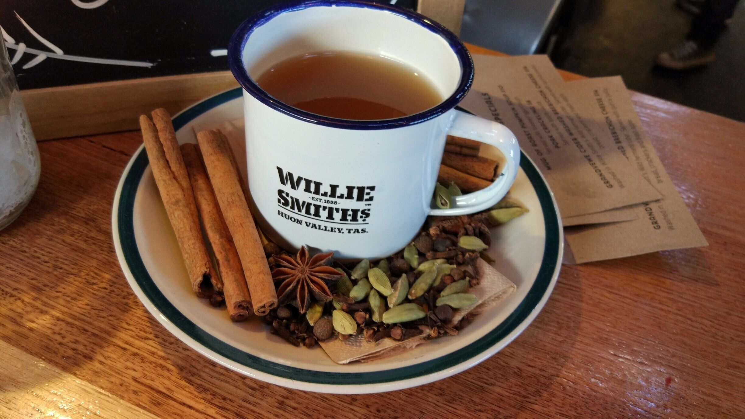 A cup of tea with a label reading "Willie Smith's Huon Valley, TAS."