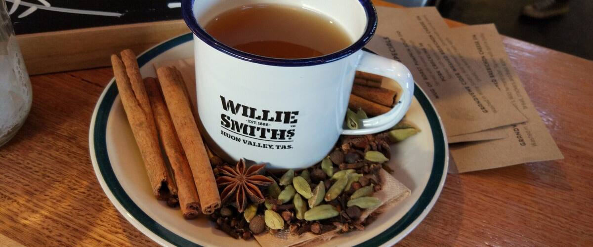A cup of tea with a label reading "Willie Smith's Huon Valley, TAS."