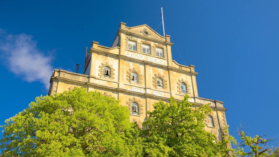 A historic building with the inscription "Cascade Brewery" and the years "1824" and "1927" on its facade.