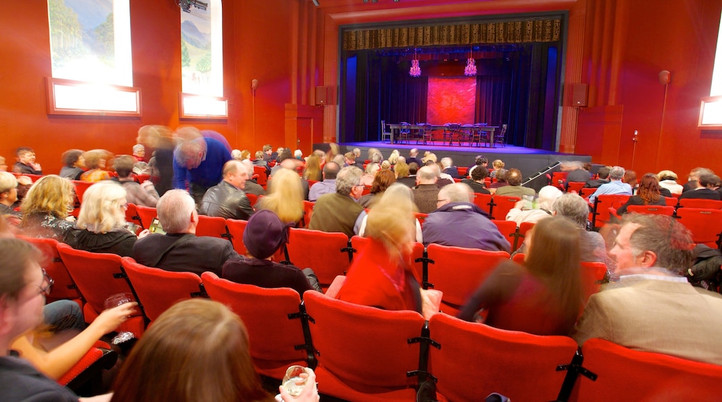 Playhouse Theatre which includes theatre scenes, performance art and interior views