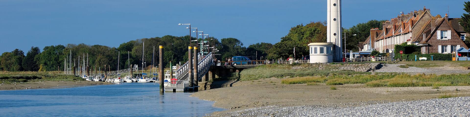 Lighthouse of Cayeux sur Mer at the Pointe du Hourdel with its pebble beach. Cayeux sur Mer is a resort town in the Somme department in Hauts-de-France in northern France