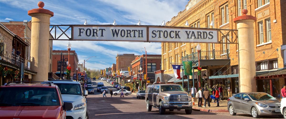Fort Worth Stockyards which includes a small town or village and signage