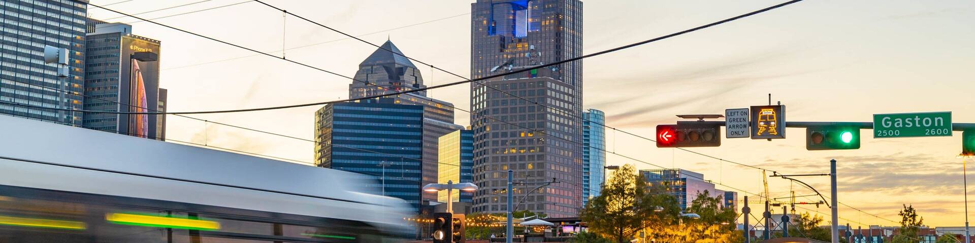 Deep Ellum which includes a city and a sunset