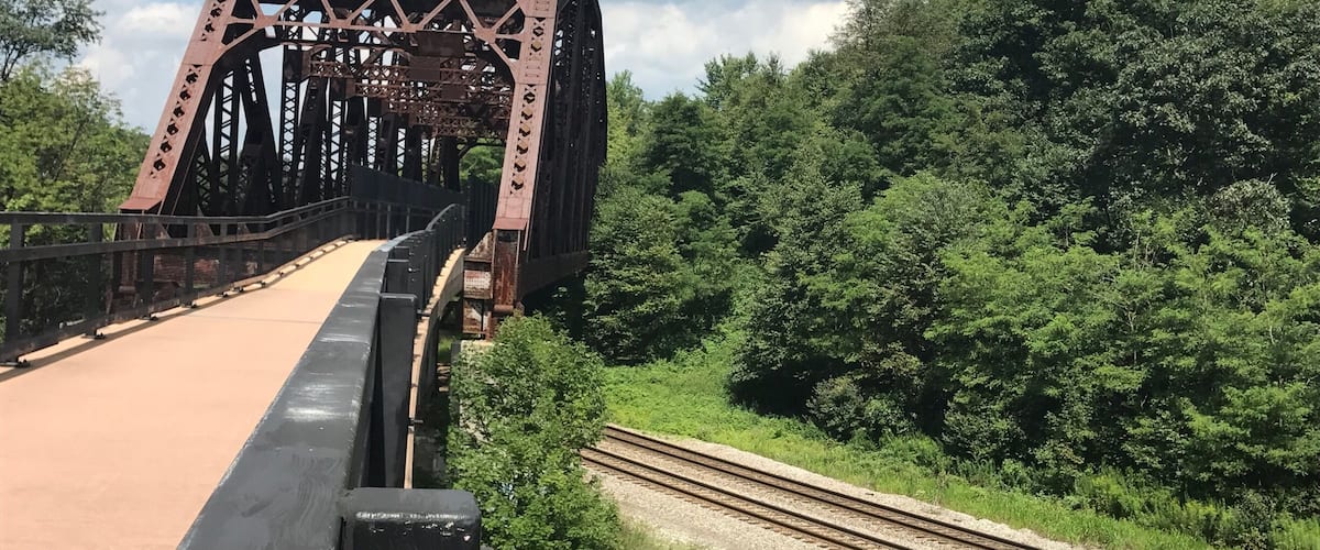 Beautiful bridge and trail running over this railway #greatalleghanypassagetrail