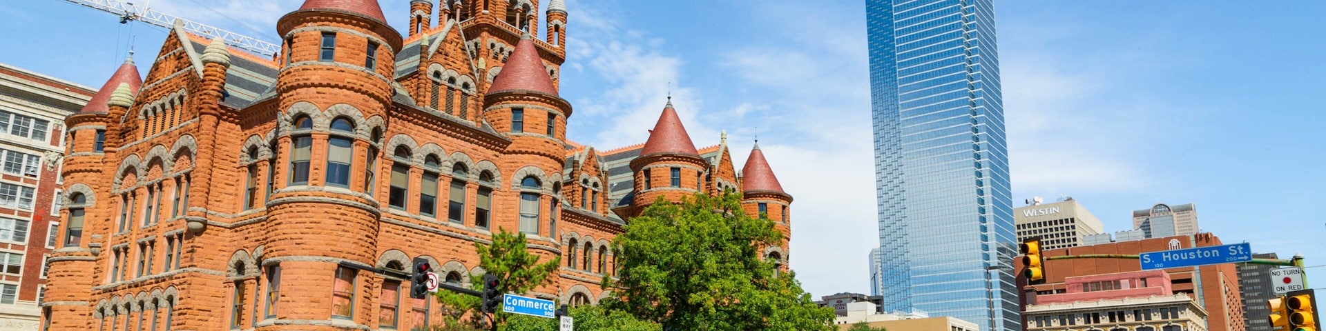 Dallas which includes a skyscraper and heritage architecture