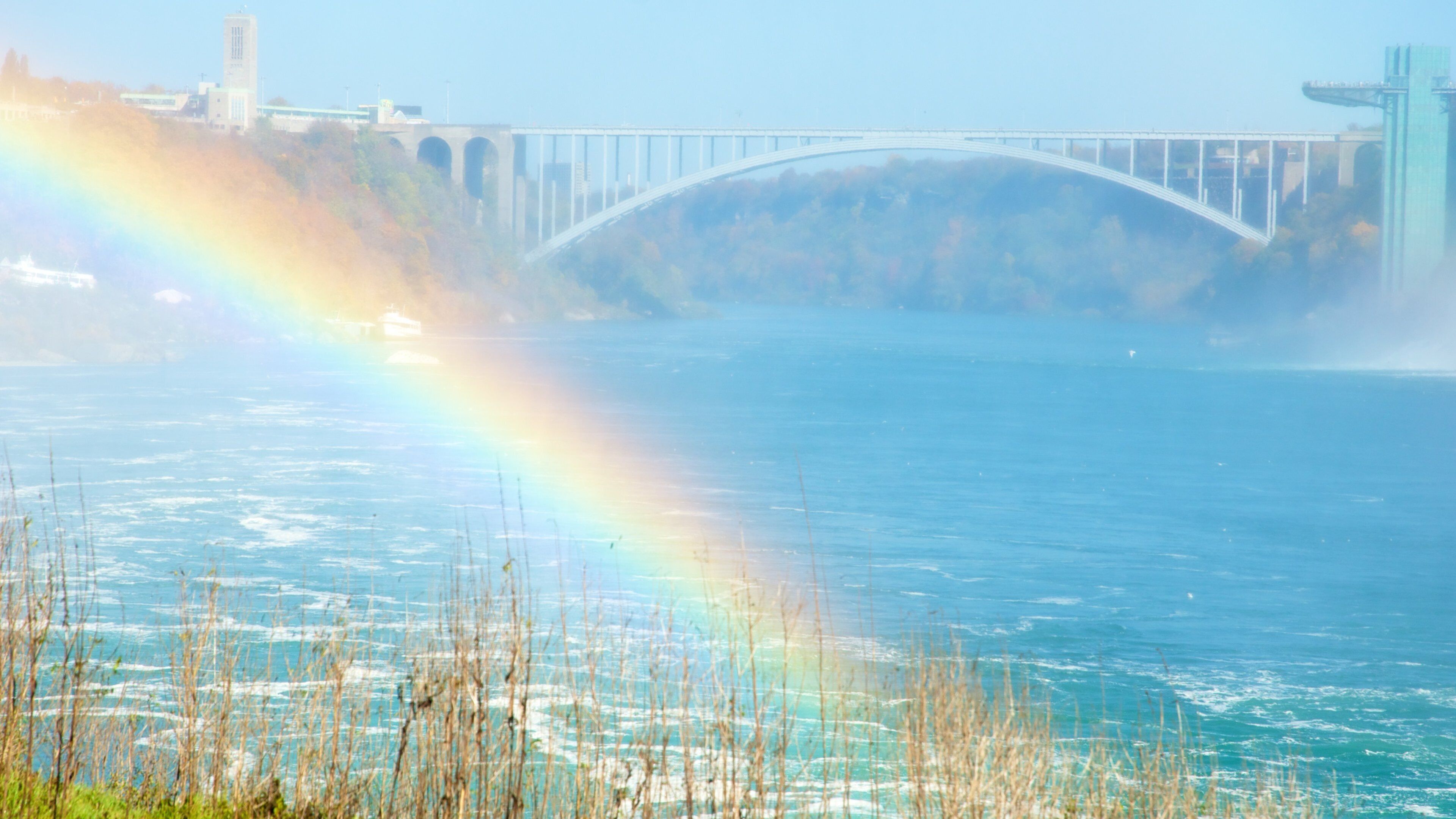 Rainbow Bridge which includes a bridge, mist or fog and landscape views