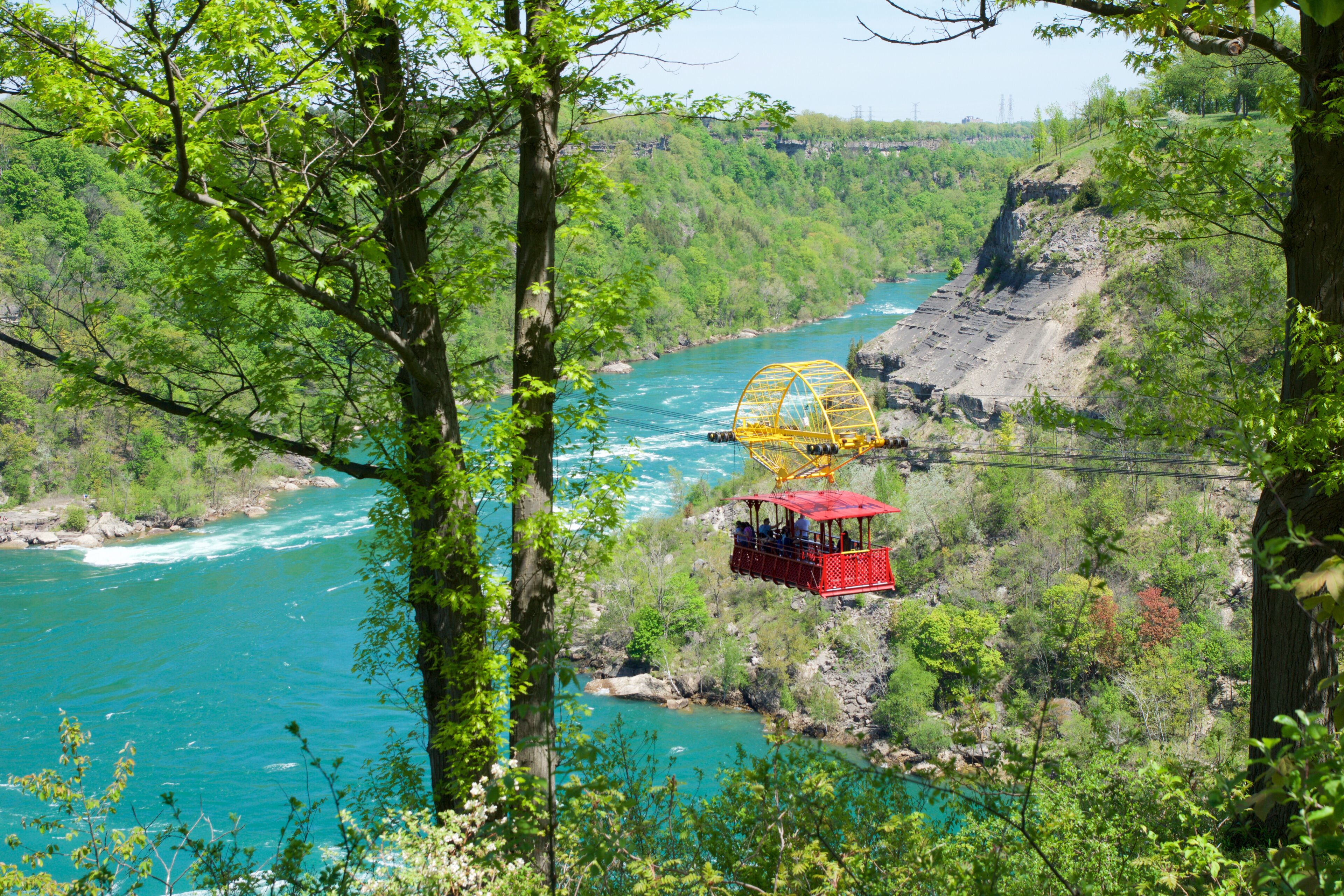 NIAGARA FALLS, ONTARIO, CANADA - MAY 21st 2018: Whirlpool Aero car carrying riders across the Niagara Whirlpool