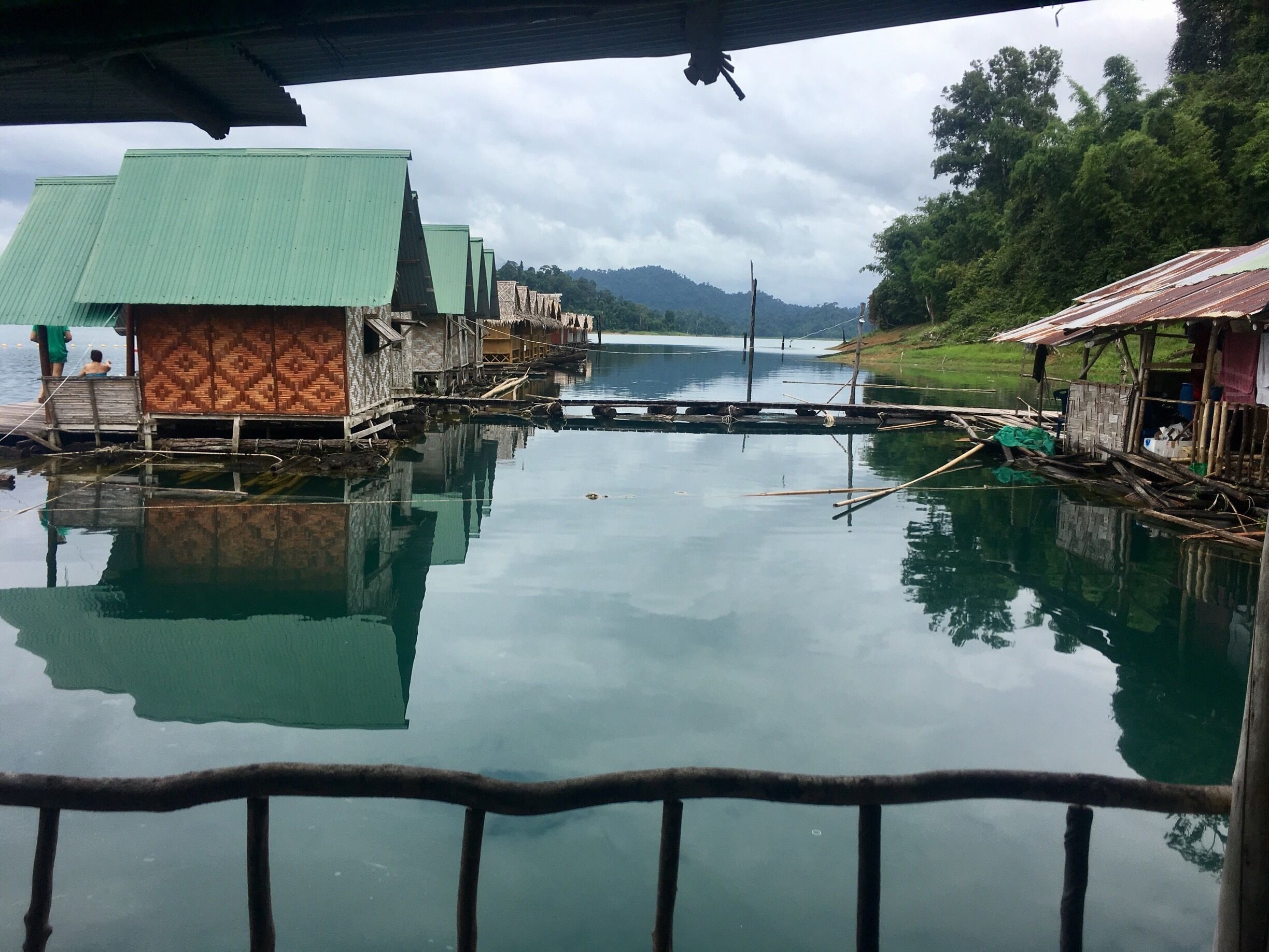 Floating bungalows on the lake in Kho Sok. Stay overnight in these rustic huts; wake up and dive straight in at dawn. 