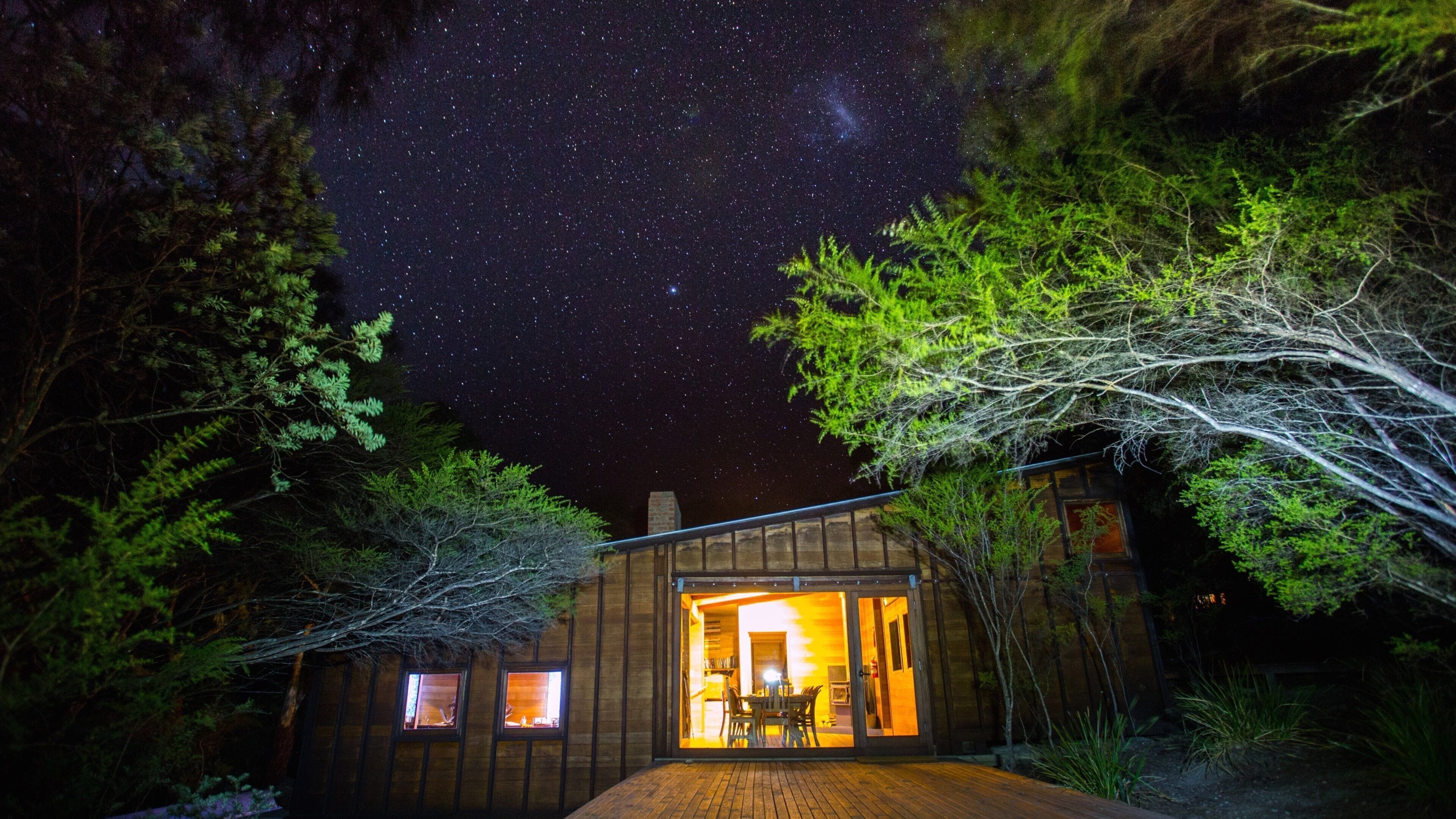 Freycinet featuring forest scenes, night scenes and a house