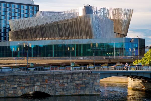 Stockholm City Conference Centre featuring a river or creek, modern architecture and a bridge