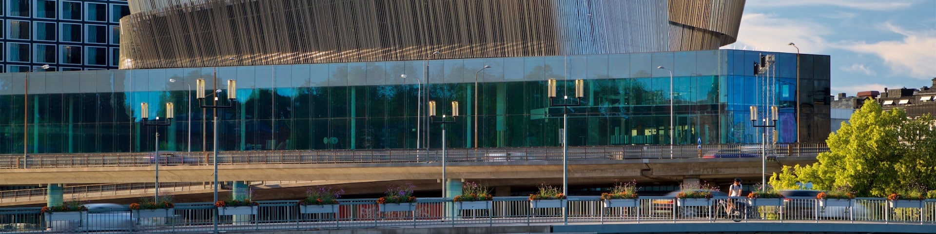 Stockholm City Conference Centre featuring a river or creek, modern architecture and a bridge