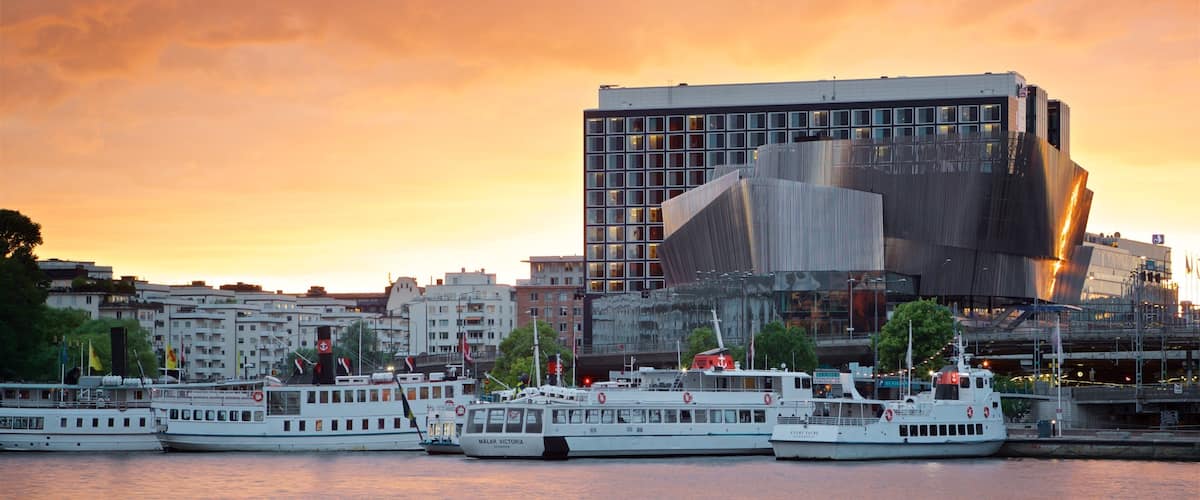 Stockholm City Conference Centre which includes a bay or harbor and a sunset