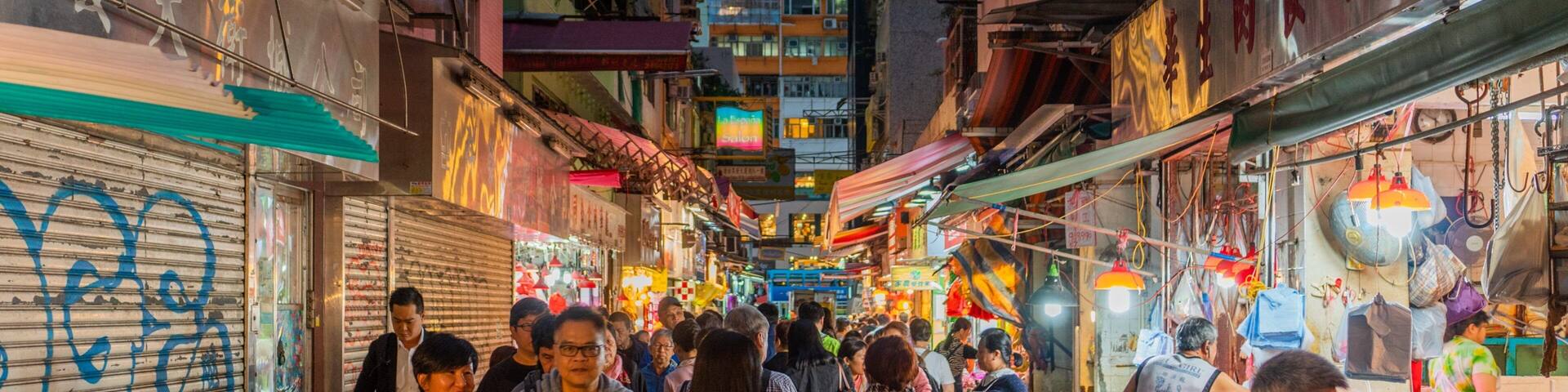 Tai Yuen Street Toy Market which includes night scenes, markets and street scenes