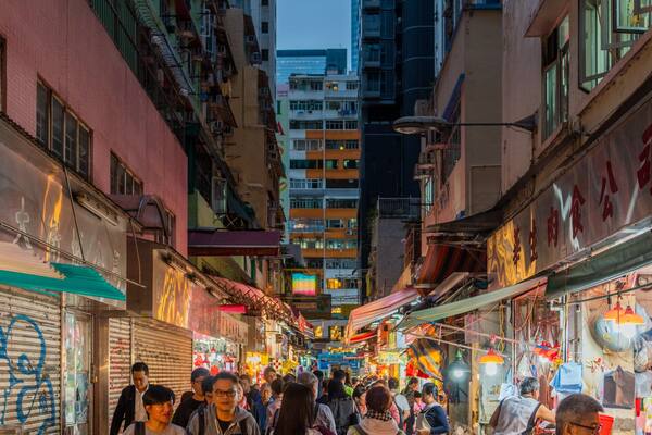 Tai Yuen Street Toy Market which includes night scenes, markets and street scenes