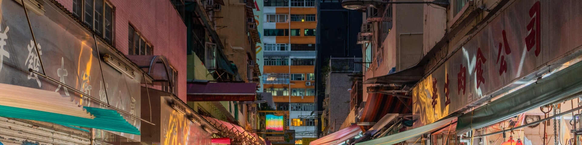 Tai Yuen Street Toy Market which includes night scenes, markets and street scenes