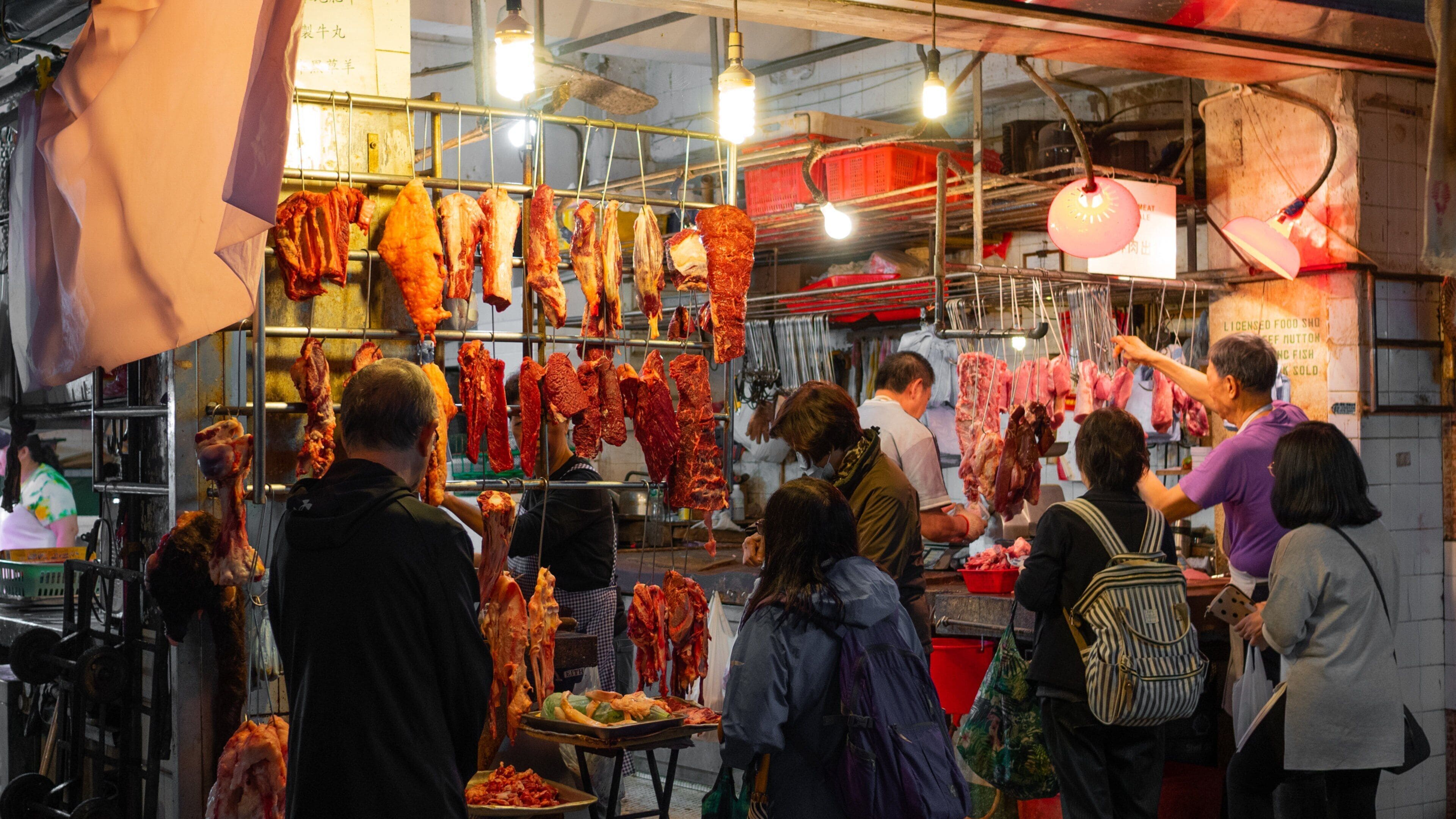 Tai Yuen Street Toy Market showing street scenes, markets and food