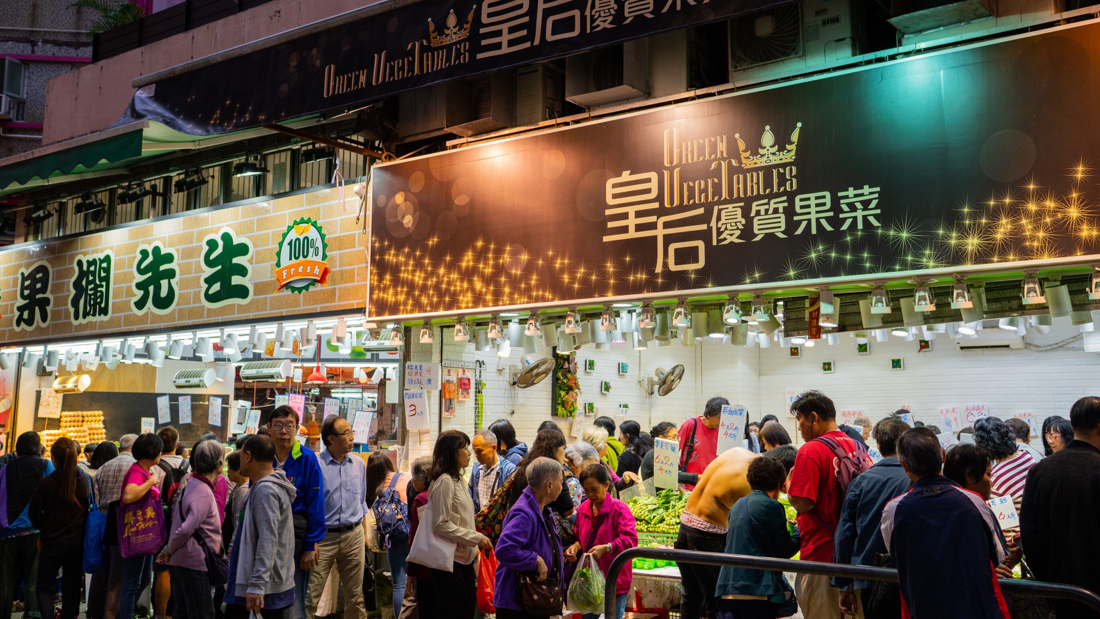 Wan Chai Road showing night scenes, signage and street scenes
