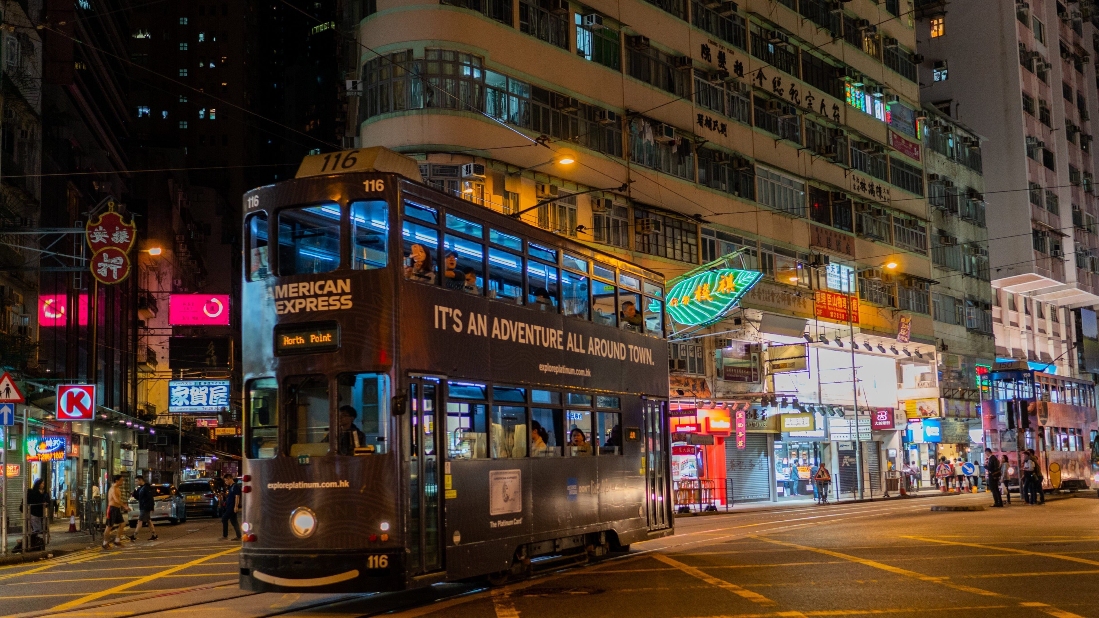 Wan Chai Road which includes street scenes, a city and night scenes