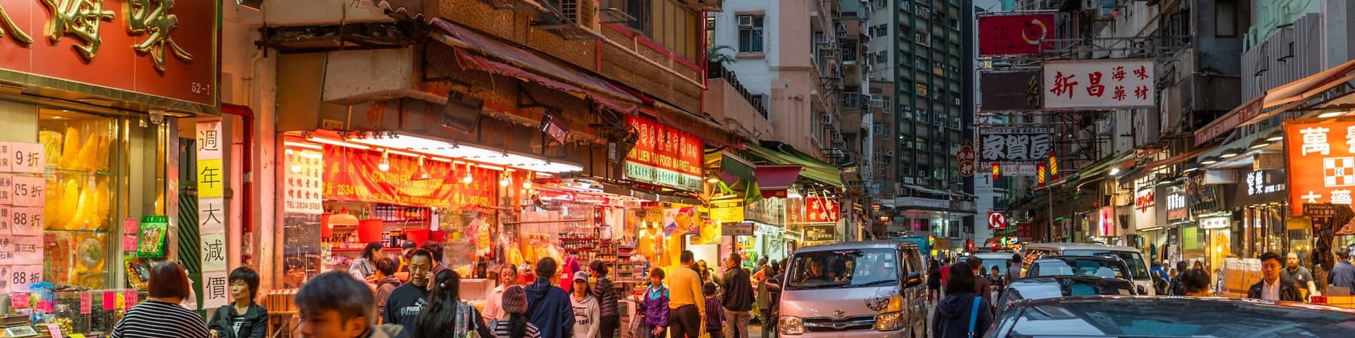 Wan Chai Road showing a city, night scenes and street scenes