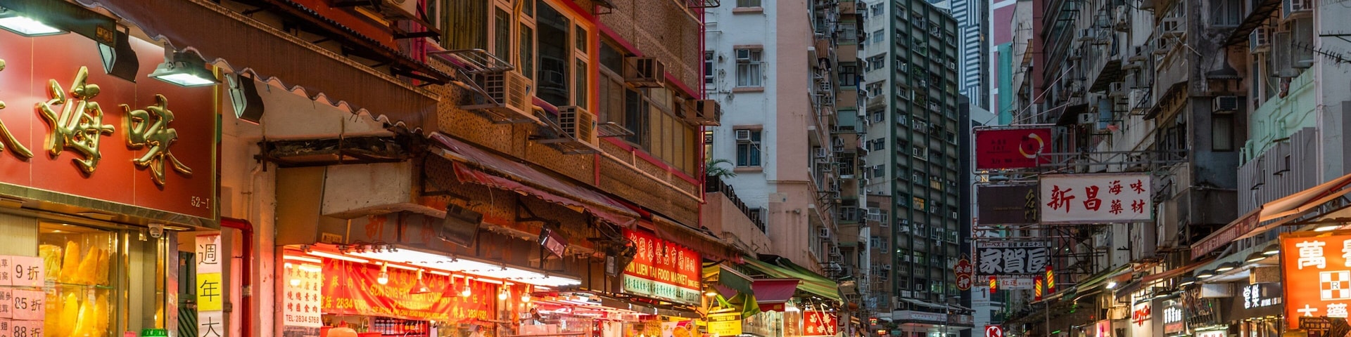 Wan Chai Road showing a city, night scenes and street scenes