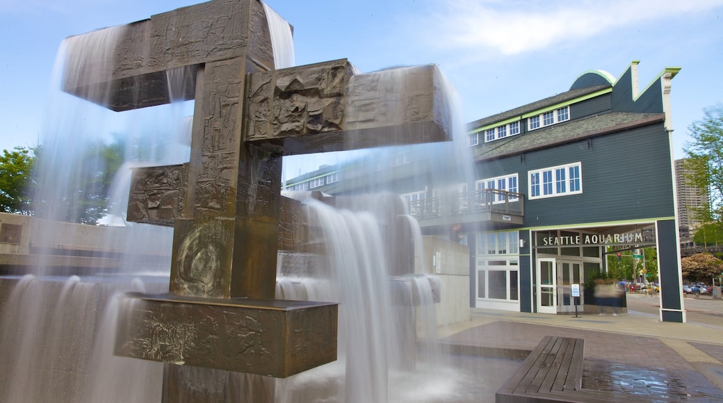 Vibrant Seattle Waterfront with cascading water feature near the Seattle Aquarium