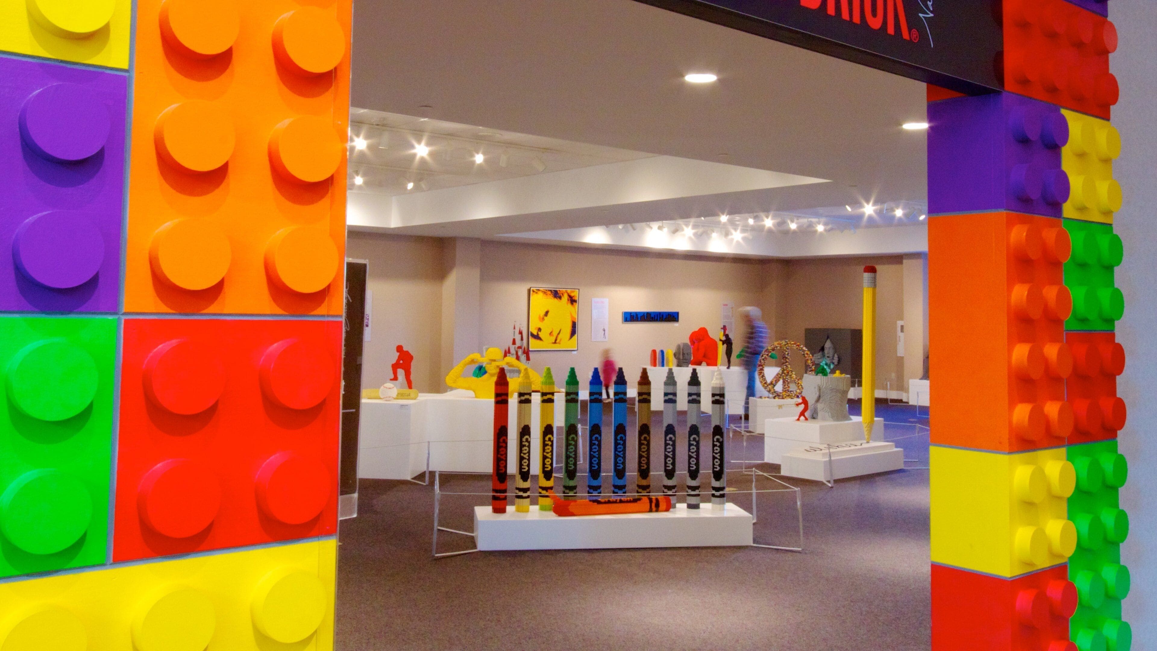 A colorful LEGO display with various shapes and figures.