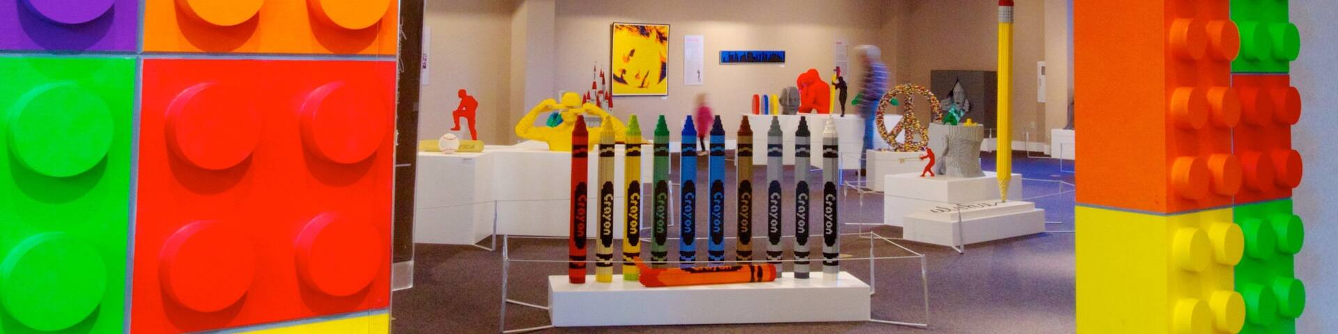 A colorful LEGO display with various shapes and figures.