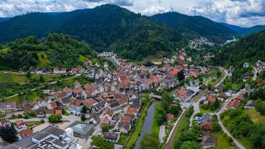 Aerial panoramic view of the city Schiltach in Germany, Baden-Wurttemberg on a sunny spring afternoon.