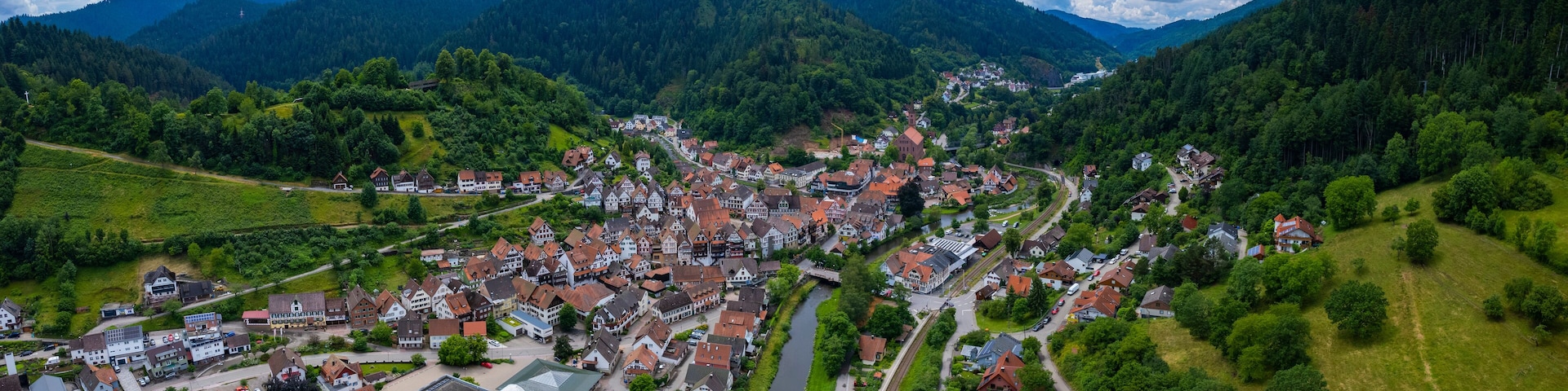 Aerial panoramic view of the city Schiltach in Germany, Baden-Wurttemberg on a sunny spring afternoon.