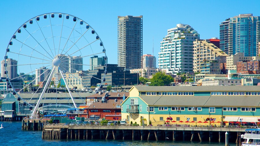 Seattle Great Wheel showing a bay or harbor, a skyscraper and modern architecture