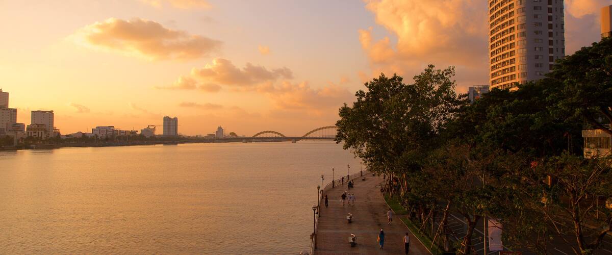 Han River showing a bridge, general coastal views and a sunset