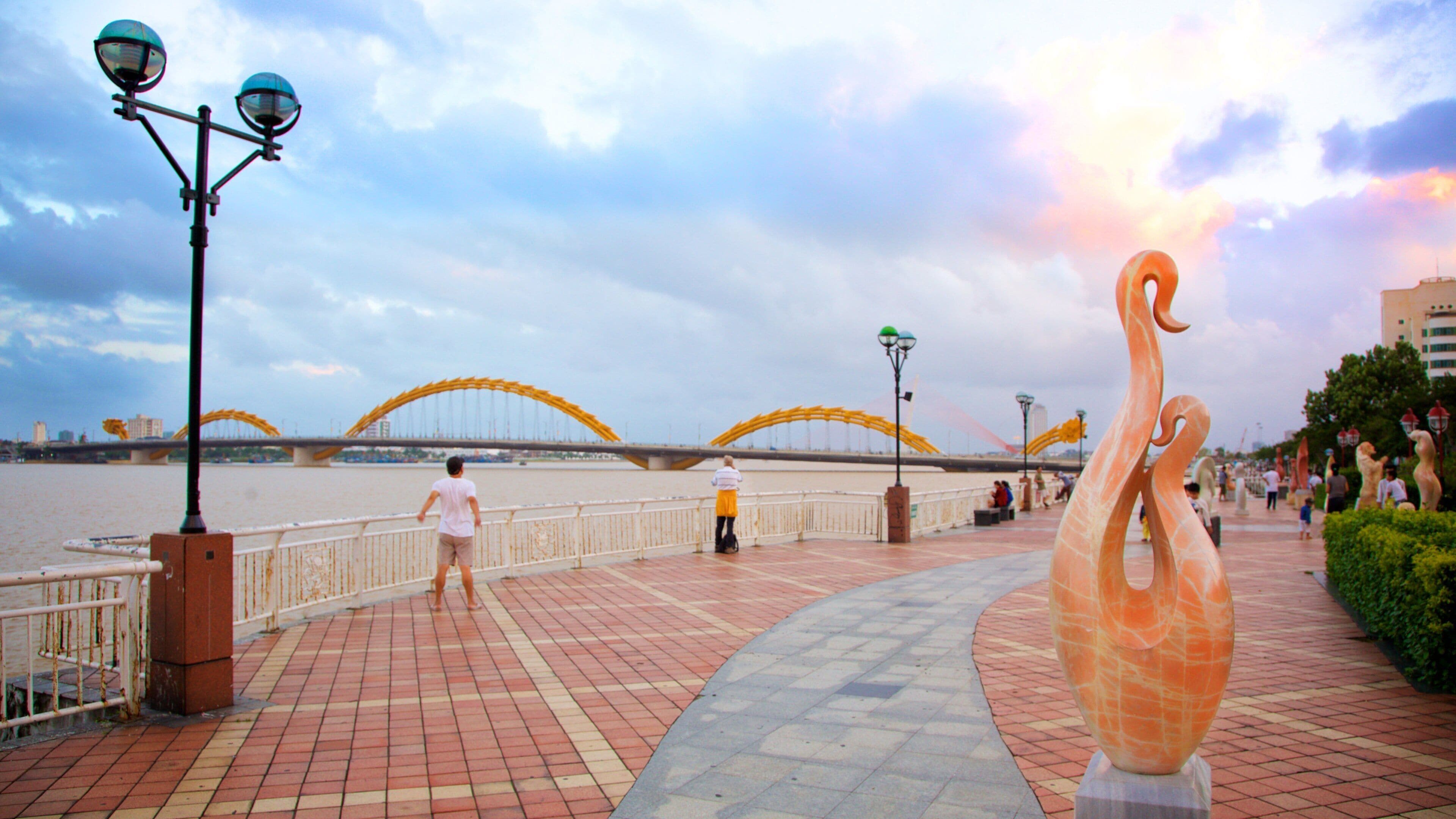Han River which includes outdoor art, a bridge and general coastal views