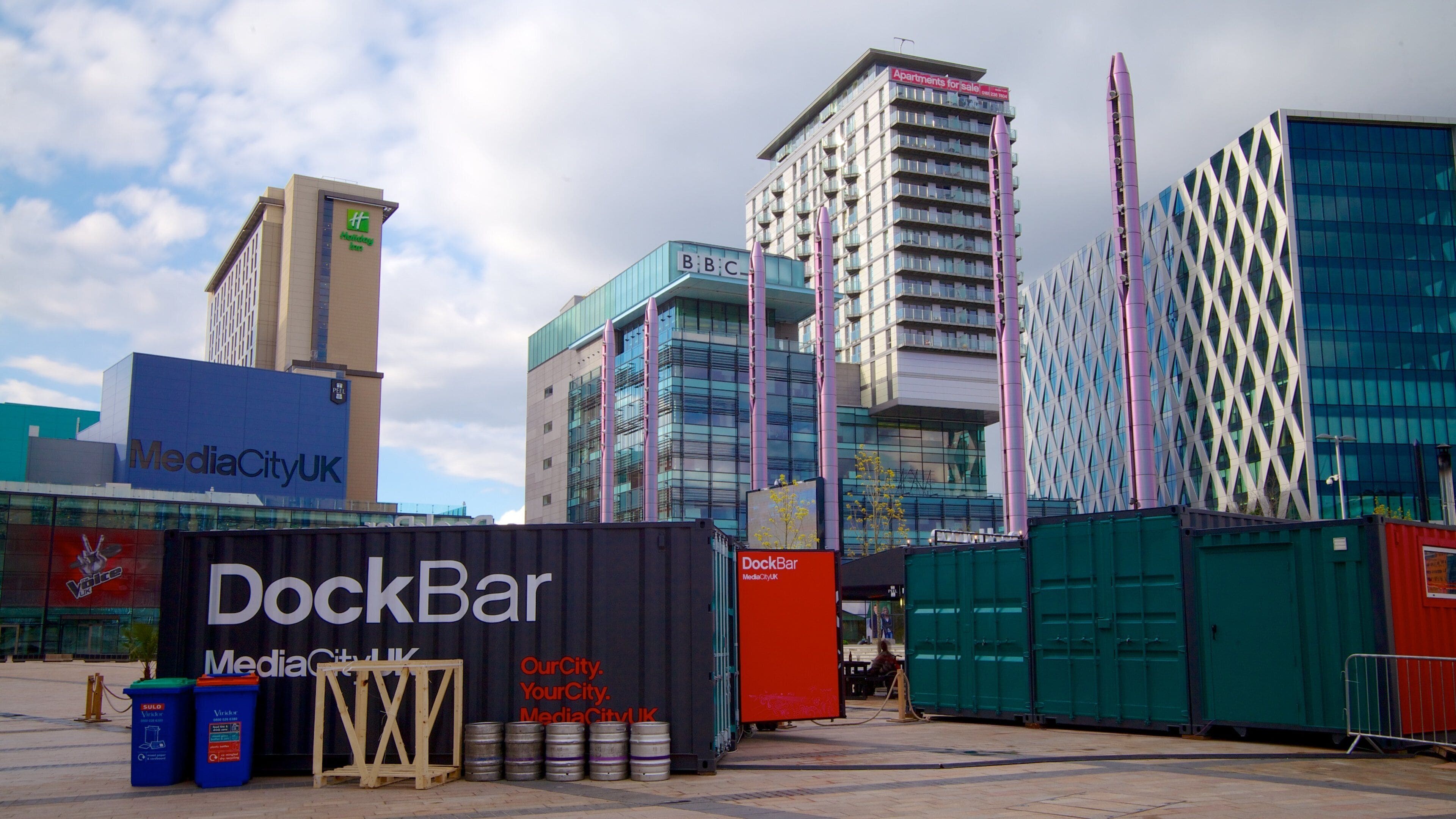 MediaCityUK which includes modern architecture, signage and a city