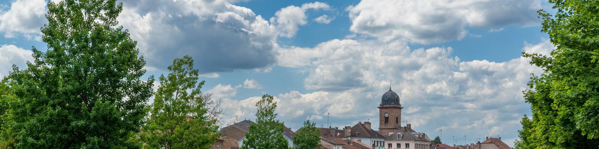 view of the picturesque small town of Raon-L'Etape in the Vosges mountains of France
