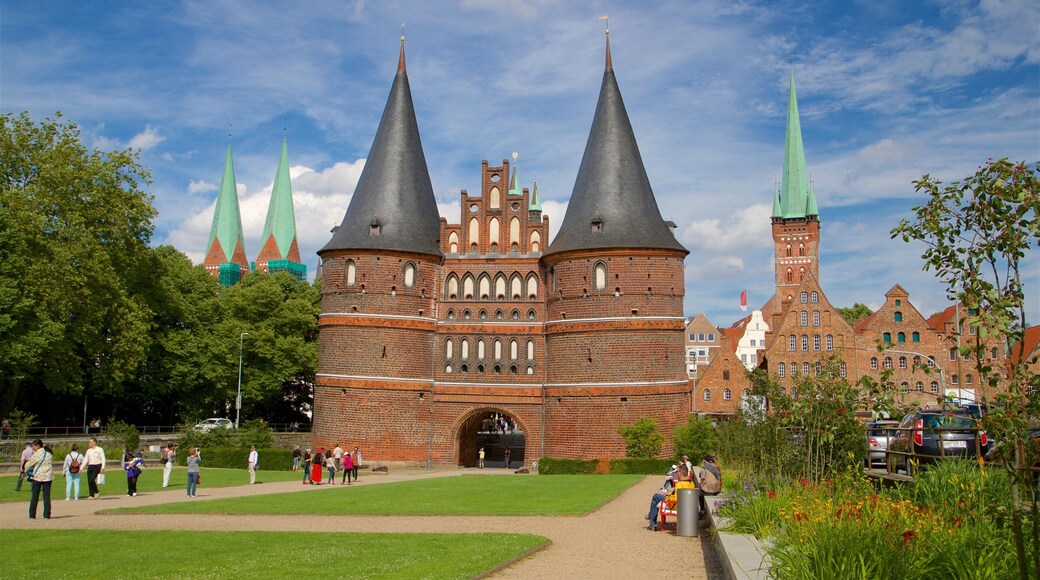 Museum Holstentor featuring wild flowers, a garden and heritage architecture