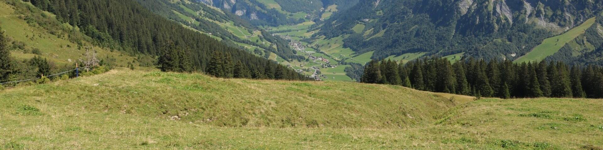 NO EDITING: a clear view down to a small town called Elm. There are beautiful landscapes which invite to go out for a hike...