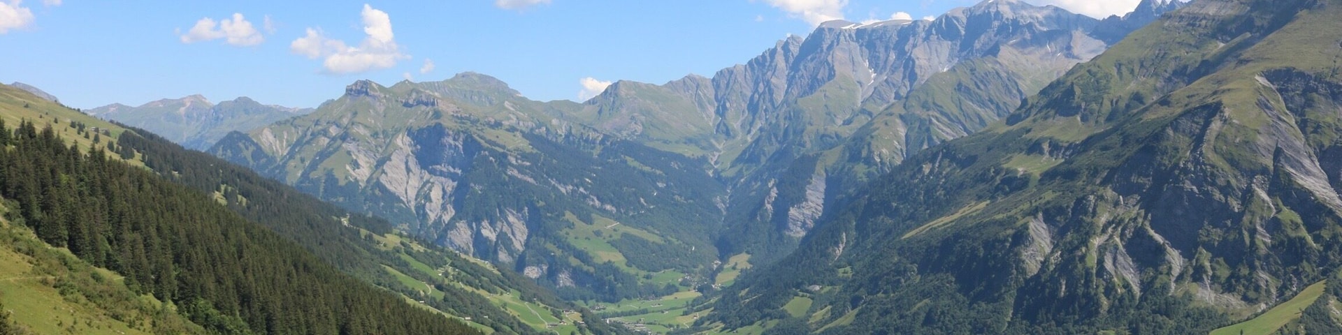 NO EDITING: a clear view down to a small town called Elm. There are beautiful landscapes which invite to go out for a hike...