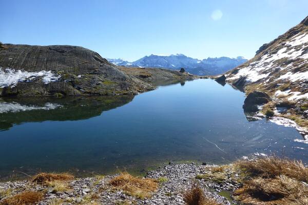 Hiking up the mountain you pass several picturesque lakes. Always in sight are the magnificent mountains ranges.