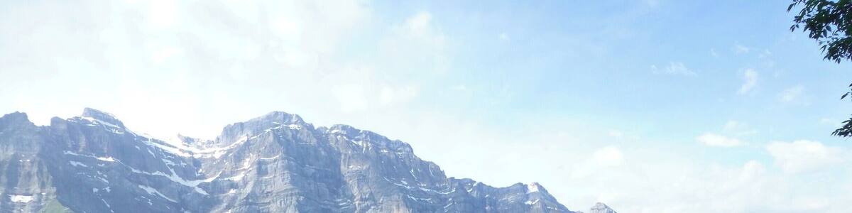 Beautiful lake situated between steep mountain ranges in the Swiss alps. Great place for hikes and swimming.