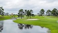Myrtlewood Golf Club featuring a river or creek and golf