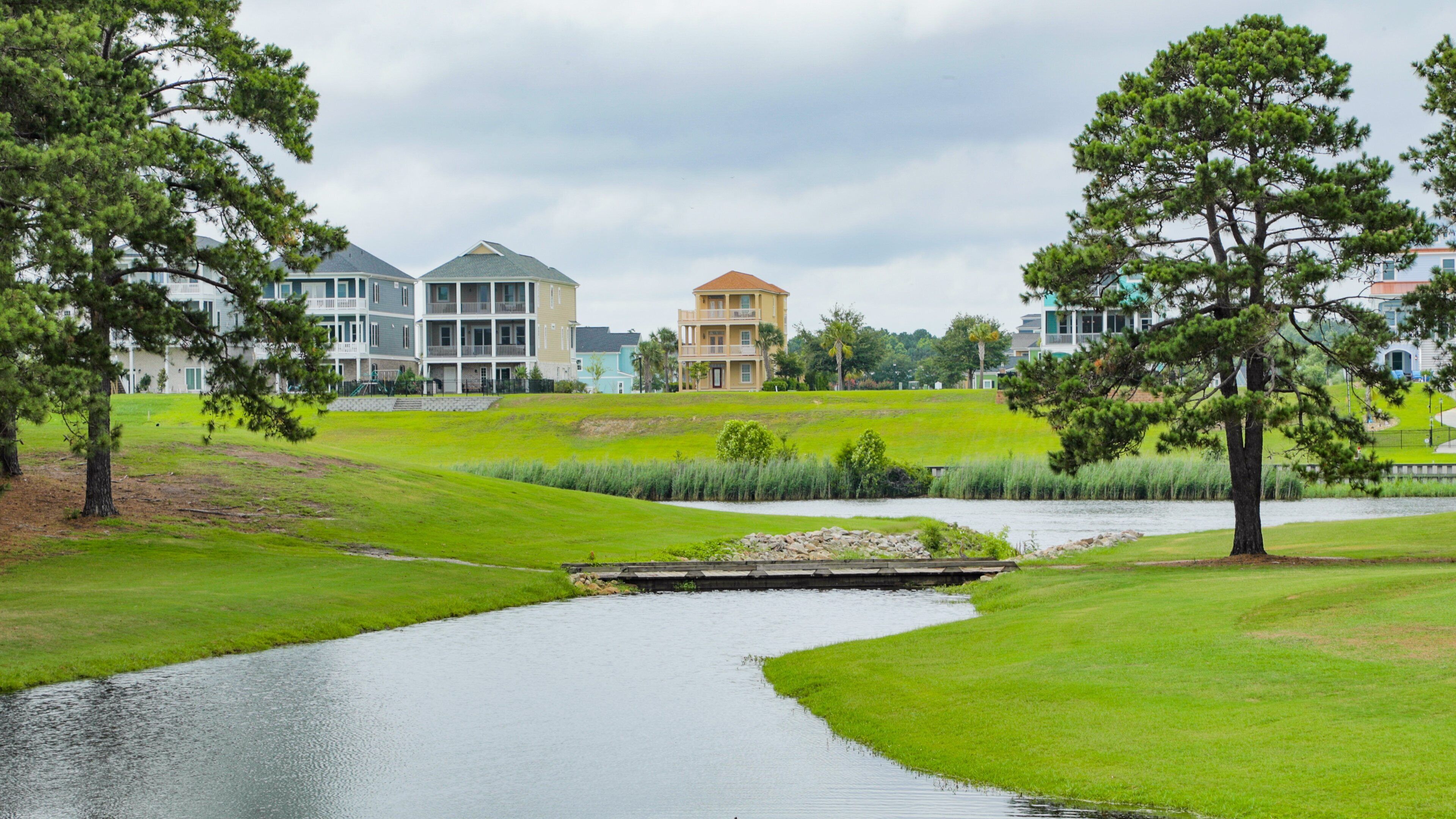 Myrtlewood Golf Club featuring golf and a river or creek